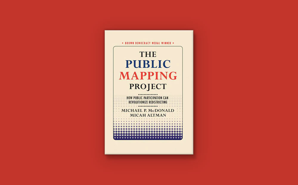 The Public Mapping book on a table.